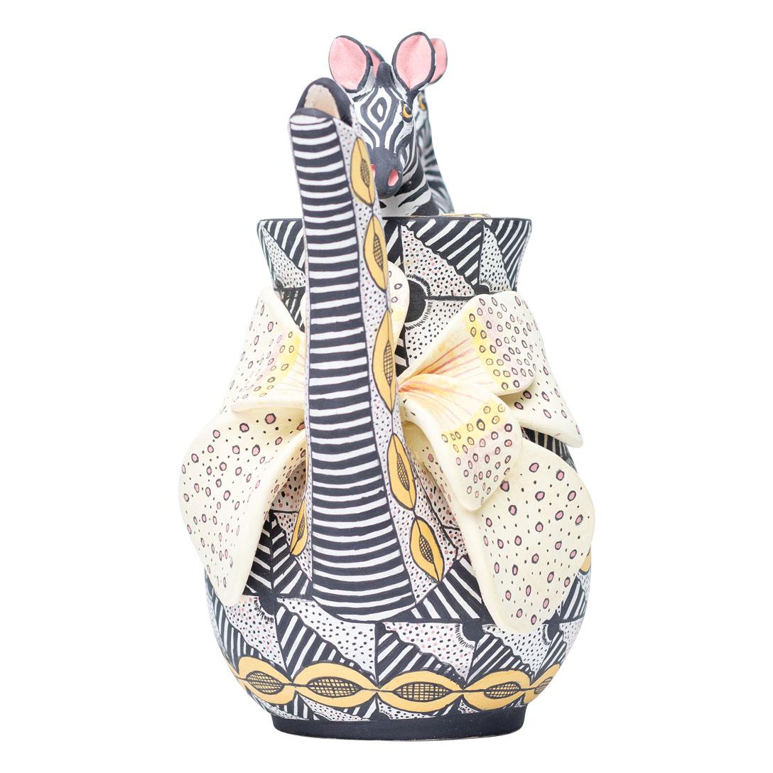 
Love Art Ceramic's zebra teapot, sculpted by Sbusiso Ndaba and painted by Sli Mazibuko, this is a unique piece of art these artist only make one never repeat the same piece, embodies South African craftsmanship. Zebras roam savannas in herds,