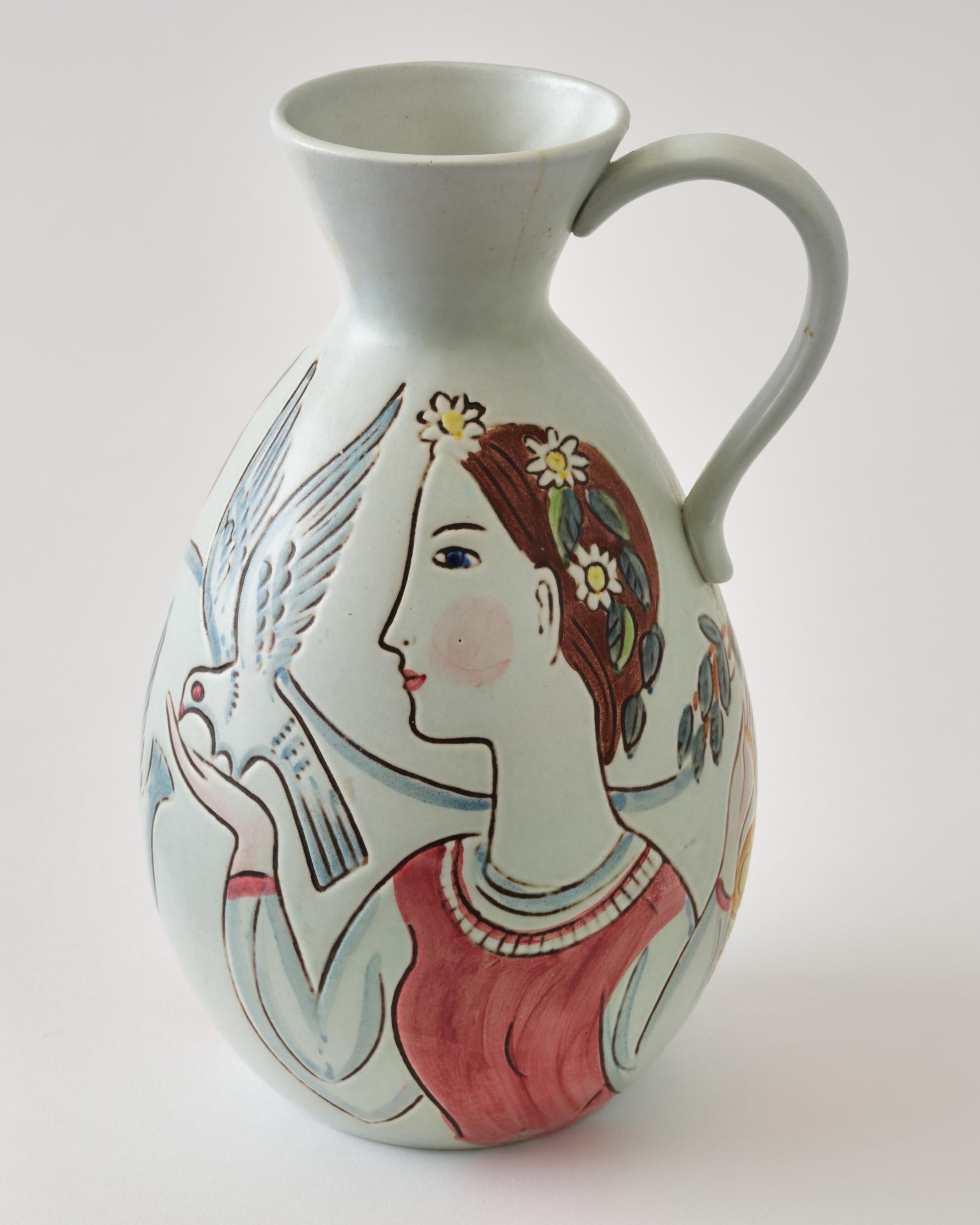 Beautiful vase by Cari-Harry Stalhane, Sweden, C 1950. Item is produced by Rorstrand Ceramic factory. 
The illustration show a woman with a bird and a man with a hunting gear.
Strong colors. The vase is signed.
The vase has a hair thin line from the