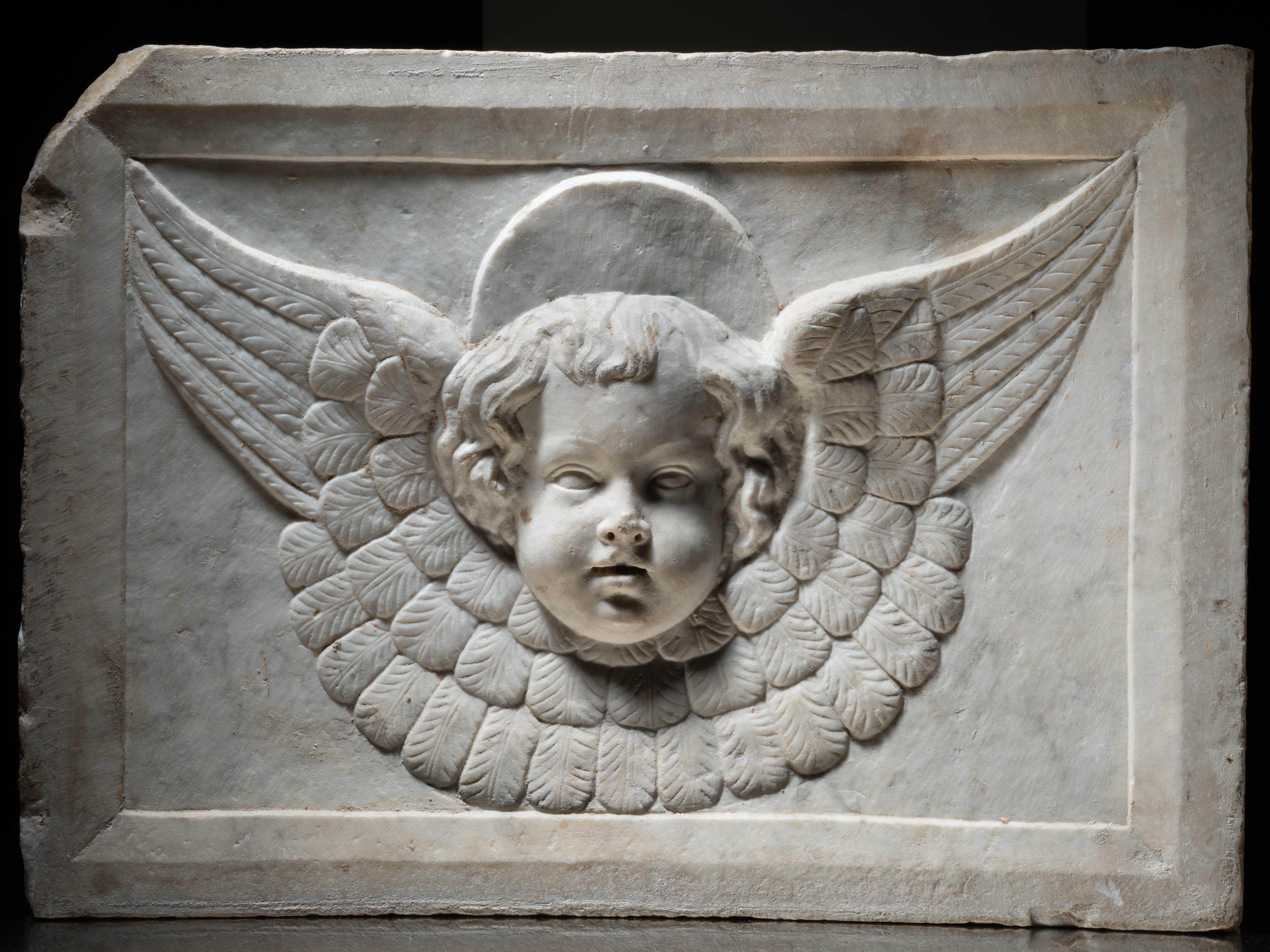 Renaissance Cercle of Jacopo della Pila - Marble relief depicting a winged Cherub For Sale
