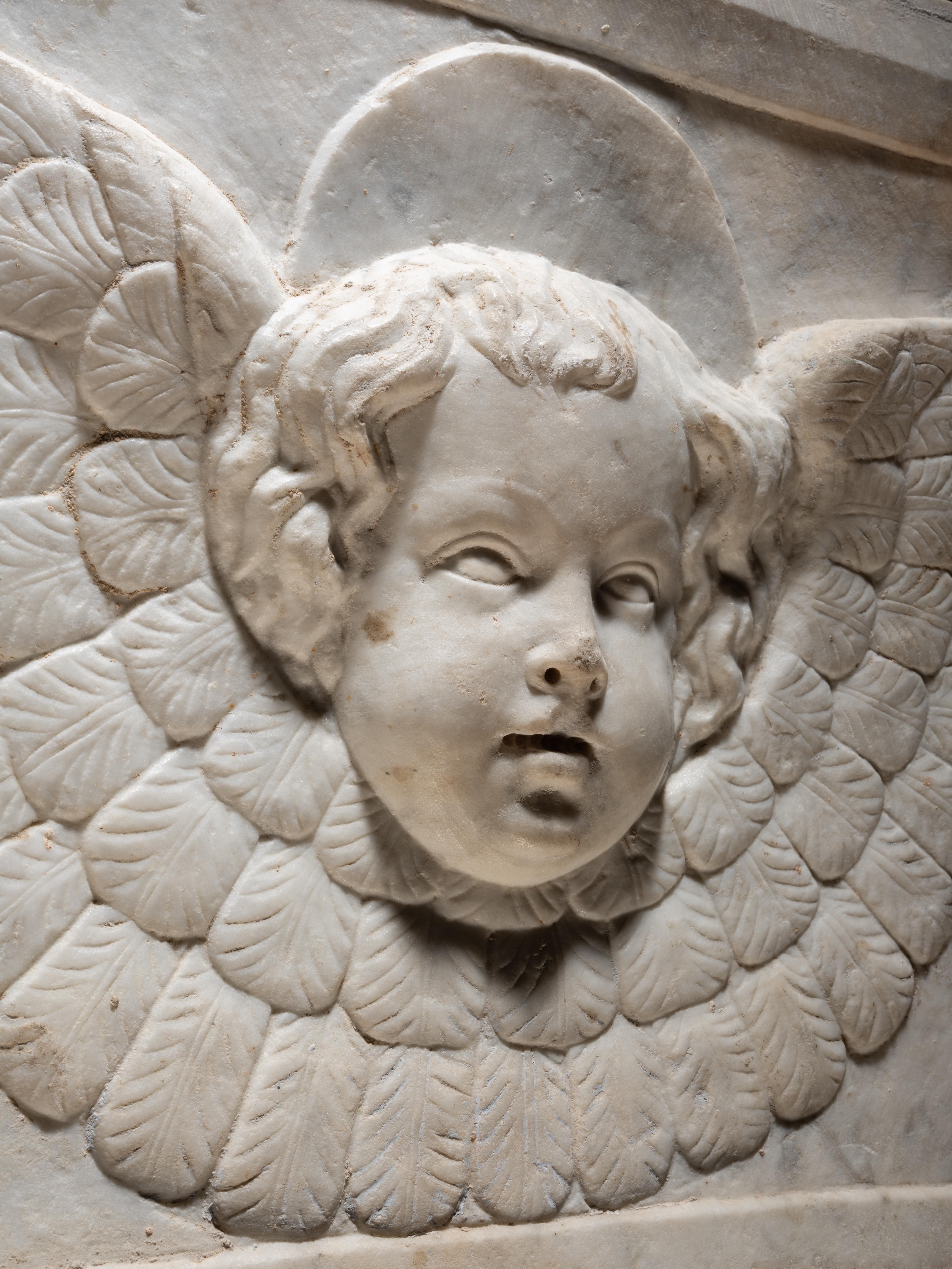 Italian Cercle of Jacopo della Pila - Marble relief depicting a winged Cherub For Sale