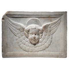 Antique Cercle of Jacopo della Pila - Marble relief depicting a winged Cherub