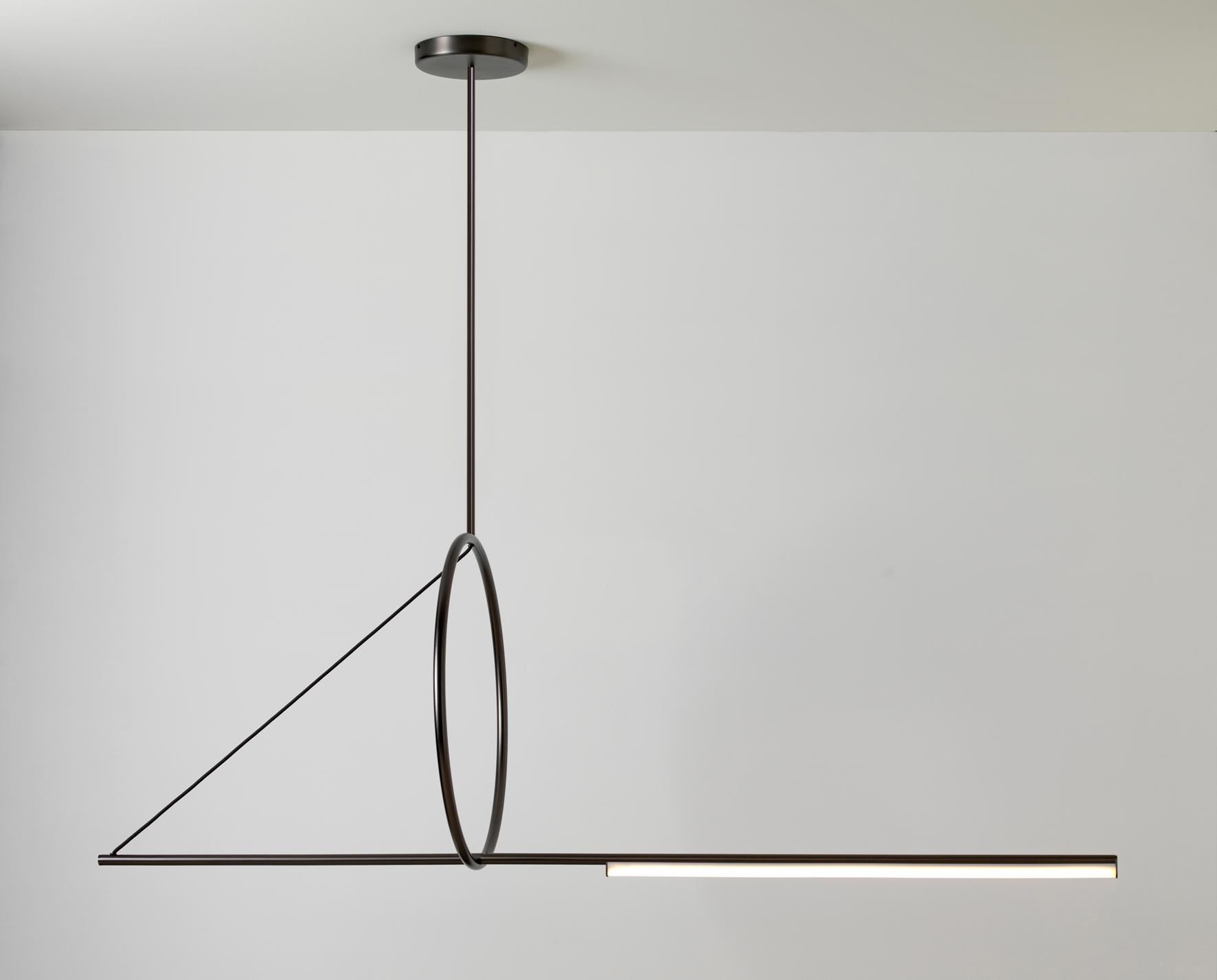Cercle & Trait XL Pendant by Pool
Dimensions: D175.5 x W20 X H163.3 cm
Materials: Solid Brass, Polycarbonate, Textile cable (1m).
Others finishes and dimensions are available.

All our lamps can be wired according to each country. If sold to