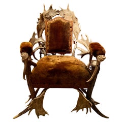 Antique Ceremonial armchair made of deer wood and covered with sheepskin