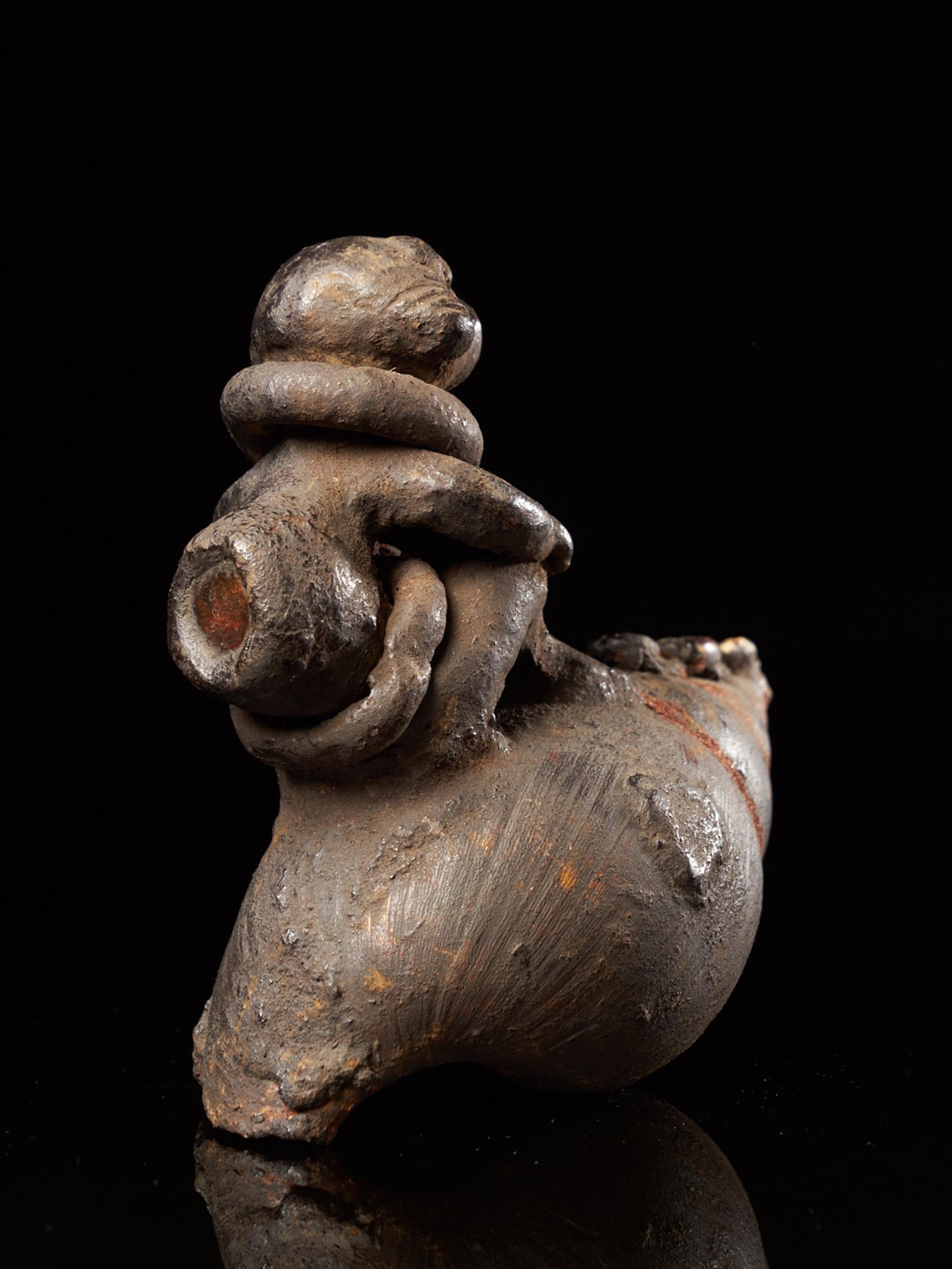 Terracotta Ceremonial Monkey Figure on a Snailshell, Old German Collection, Bulu People