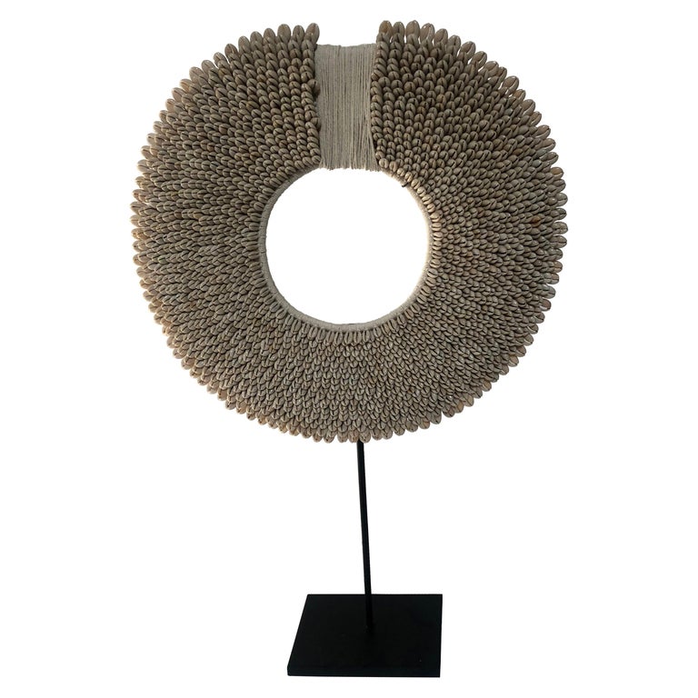 Asian ceremonial shell necklace on stand, 2019, offered by Ceylon et Cie