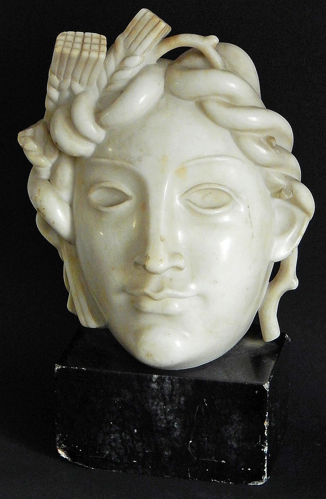 Exquisitely sculpted from a block of pale white marble, this very fine depiction of Ceres, goddess of the harvest, agriculture and fertility, is one of the finest Art Deco pieces we have ever offered. The hair of Ceres is woven with strands of