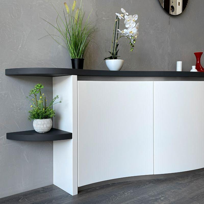 Curved Sideboard with a unique design. It's deeper than the standard, but less cluttered due to its soft and plastic shape. It is very ergonomic thanks to the absence of edges. Cernobbio is recommended for those who are looking for a piece with a