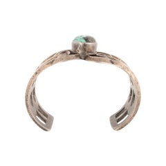 Cerrillos Turquoise and Sand Cast Sterling Silver Cuff Bracelet