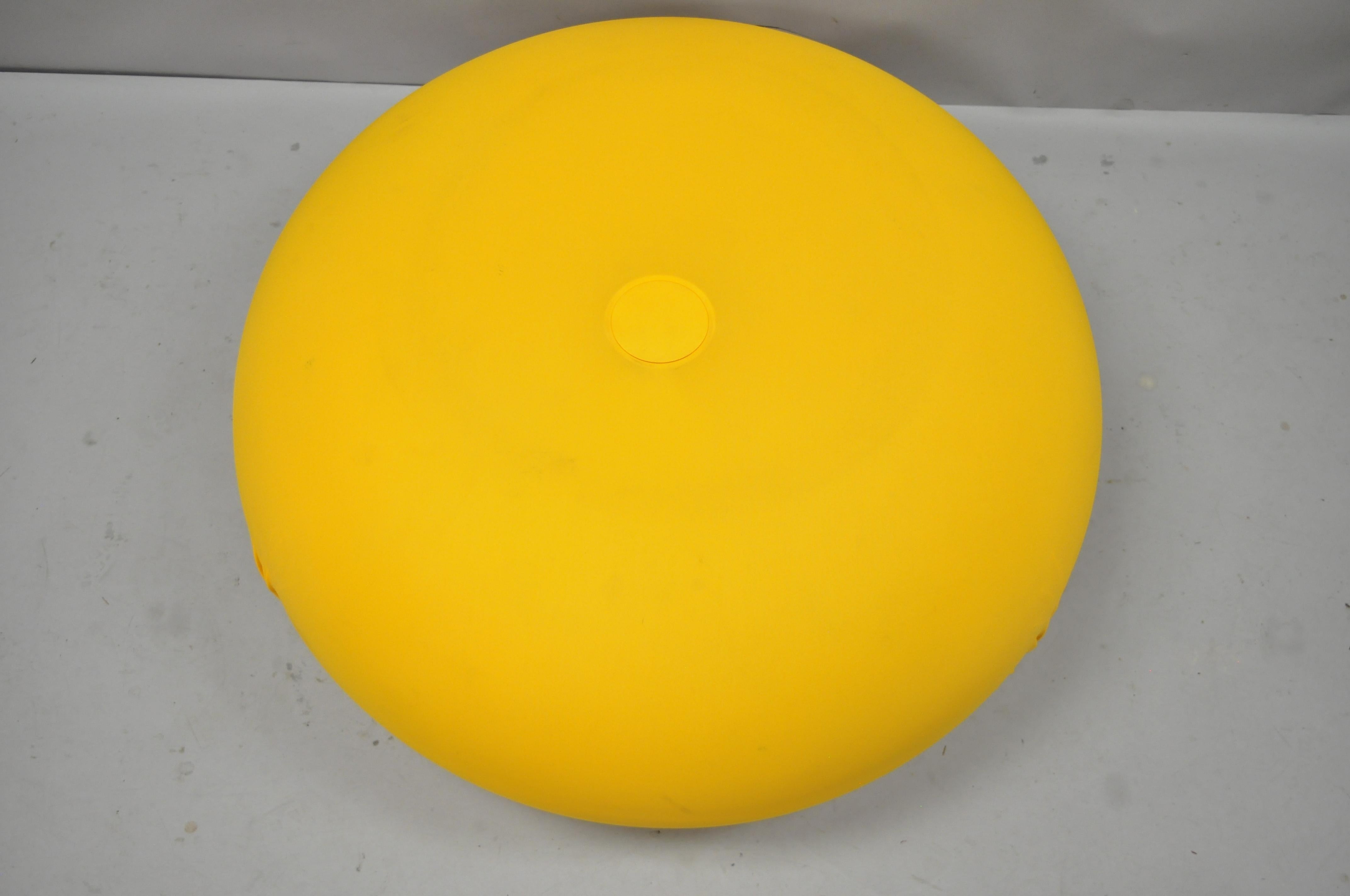 yellow round ottoman