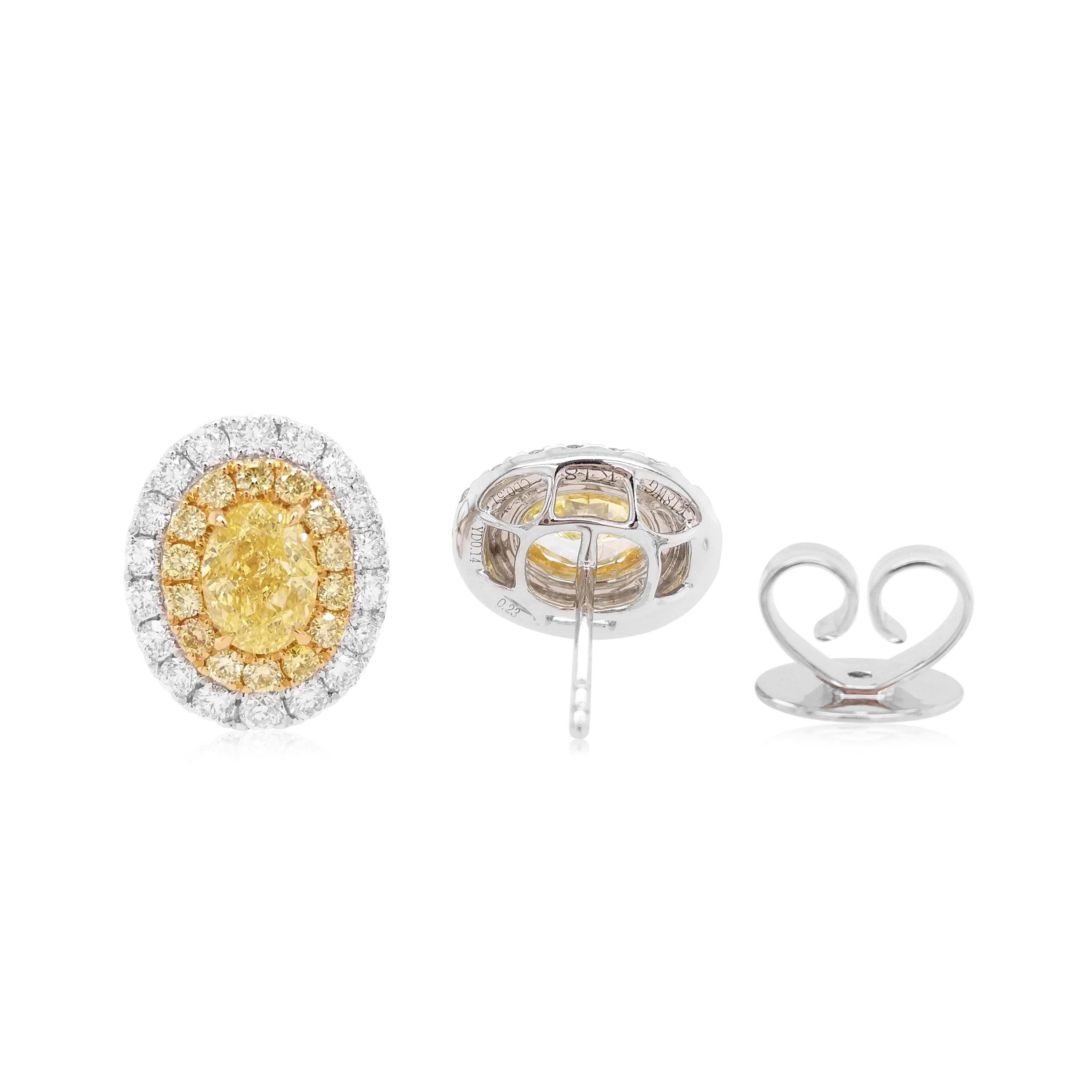 Contemporary 1.2ct GIA Certified Oval Cut Natural Yellow Diamond and White Diamond Earrings For Sale