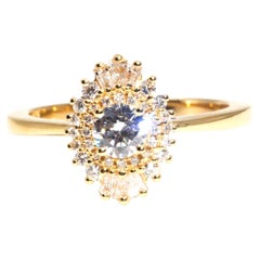 Certified 0.30 Carat Diamond D Colour Contemporary 18 Carat Gold Halo Ring