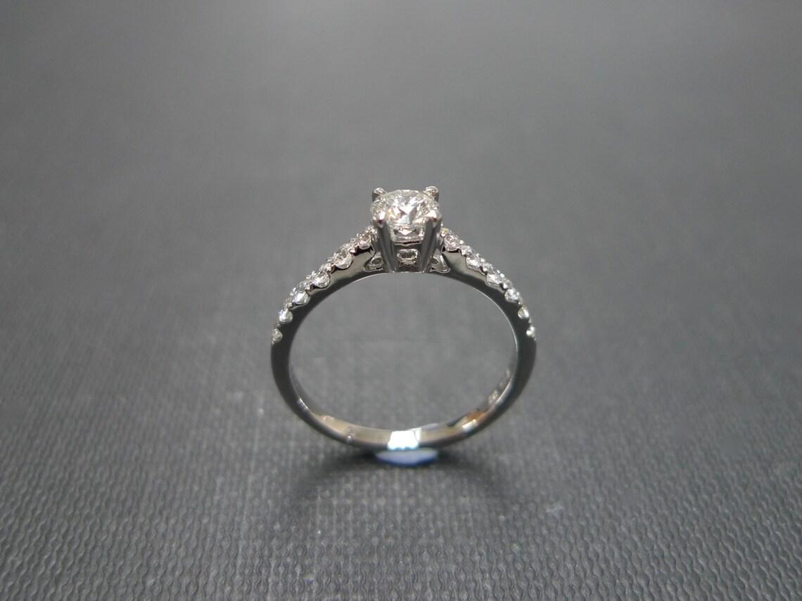 For Sale:  Certified 0.30ct Round Brilliant Cut Diamond Engagement Ring in 18K White Gold 6