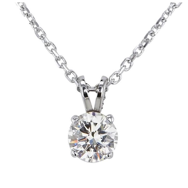 Classic 0.62 Carat Round Cut Diamond Solitaire Pendant & Necklace in 14K White Gold. Certified by IGI Laboratory in New York, with a full diamond grading report certificate.

IGI 0.62 Carat Brilliant White Round SI1 J Diamond,
with 3.00 grams of 14K