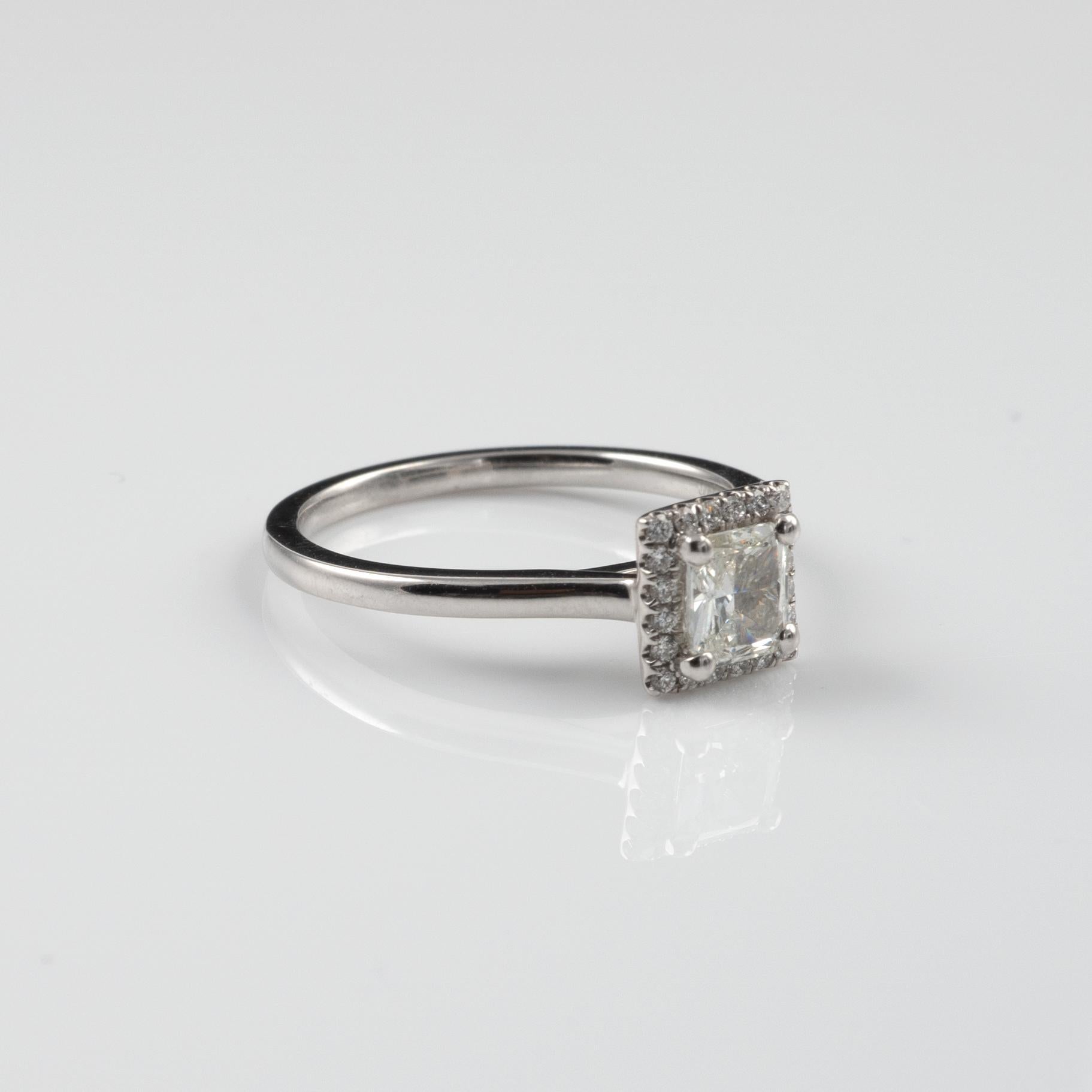 Certified Radiant Cut 0.65 Carat Diamond Halo Ring 18 Karat White Gold   In Excellent Condition For Sale In Preston, Lancashire