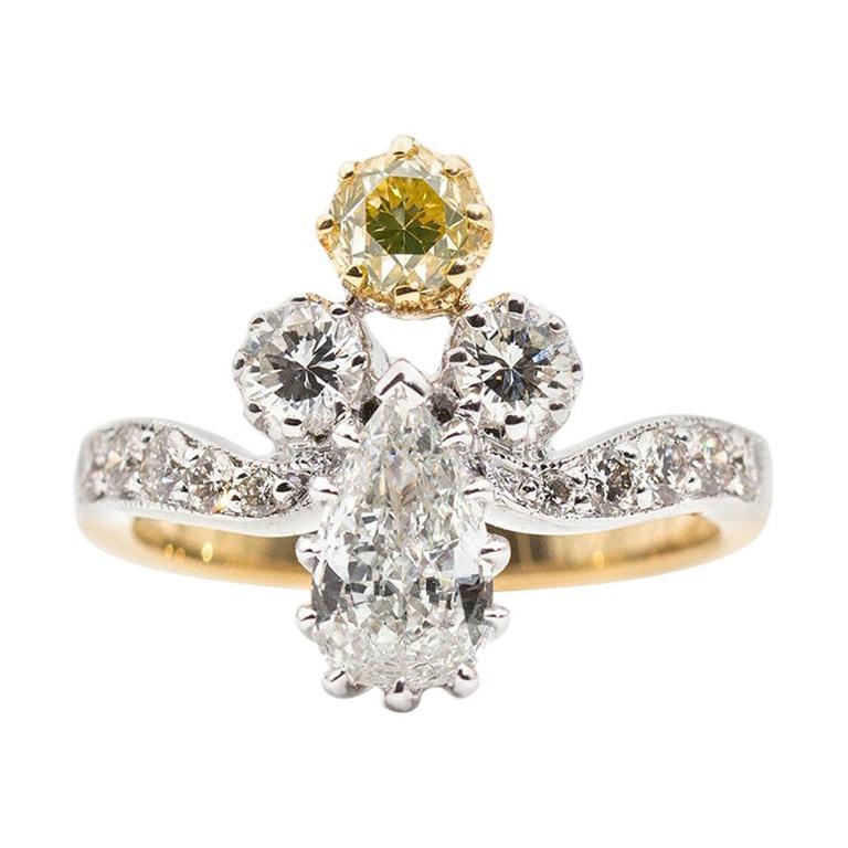 Certified 0.70 Carat Pear and Fancy Yellow Diamond Vintage 18 Carat Gold Ring