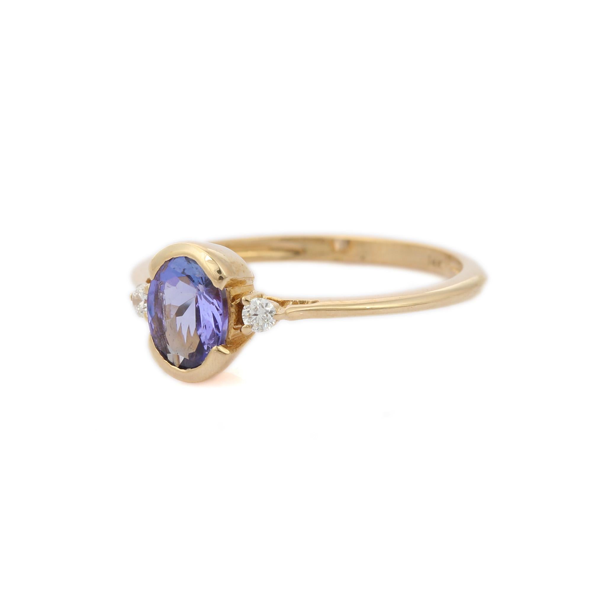 For Sale:  Certified 0.8 Carat Tanzanite and Diamond Dainty Ring in 14K Yellow Gold 2
