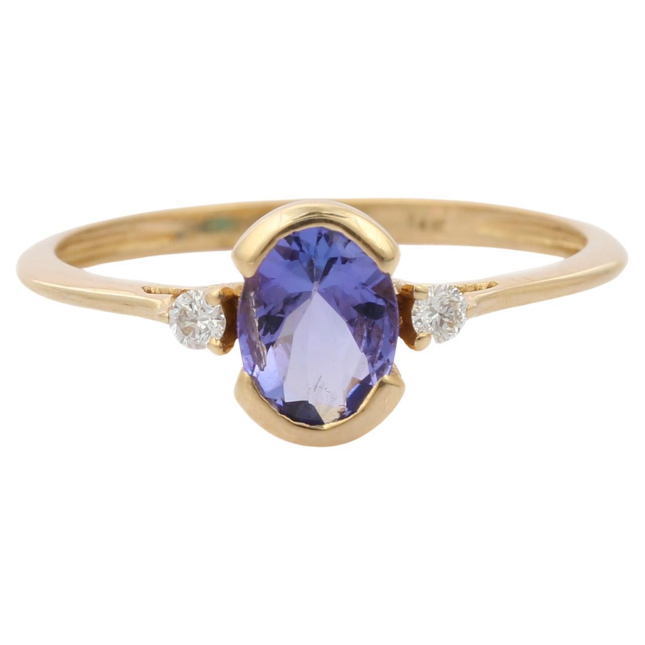 Certified 0.8 Carat Tanzanite and Diamond Dainty Ring in 14K Yellow Gold