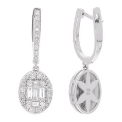 Orecchini a pendente con diamante certificato 0,87Ct SI/H in oro bianco 18 carati