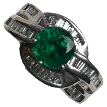 Anello Vintage certificato con smeraldo e diamanti da 1,70 carati