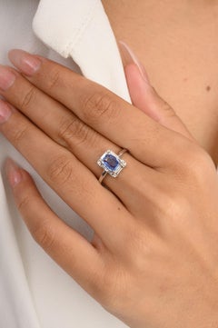 Bague de fiançailles en or blanc 14 carats avec saphir bleu certifié 0,98 carat et halo de diamants