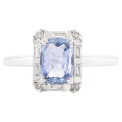 Bague de fiançailles en or blanc 14 carats avec saphir bleu certifié 0,98 carat et halo de diamants