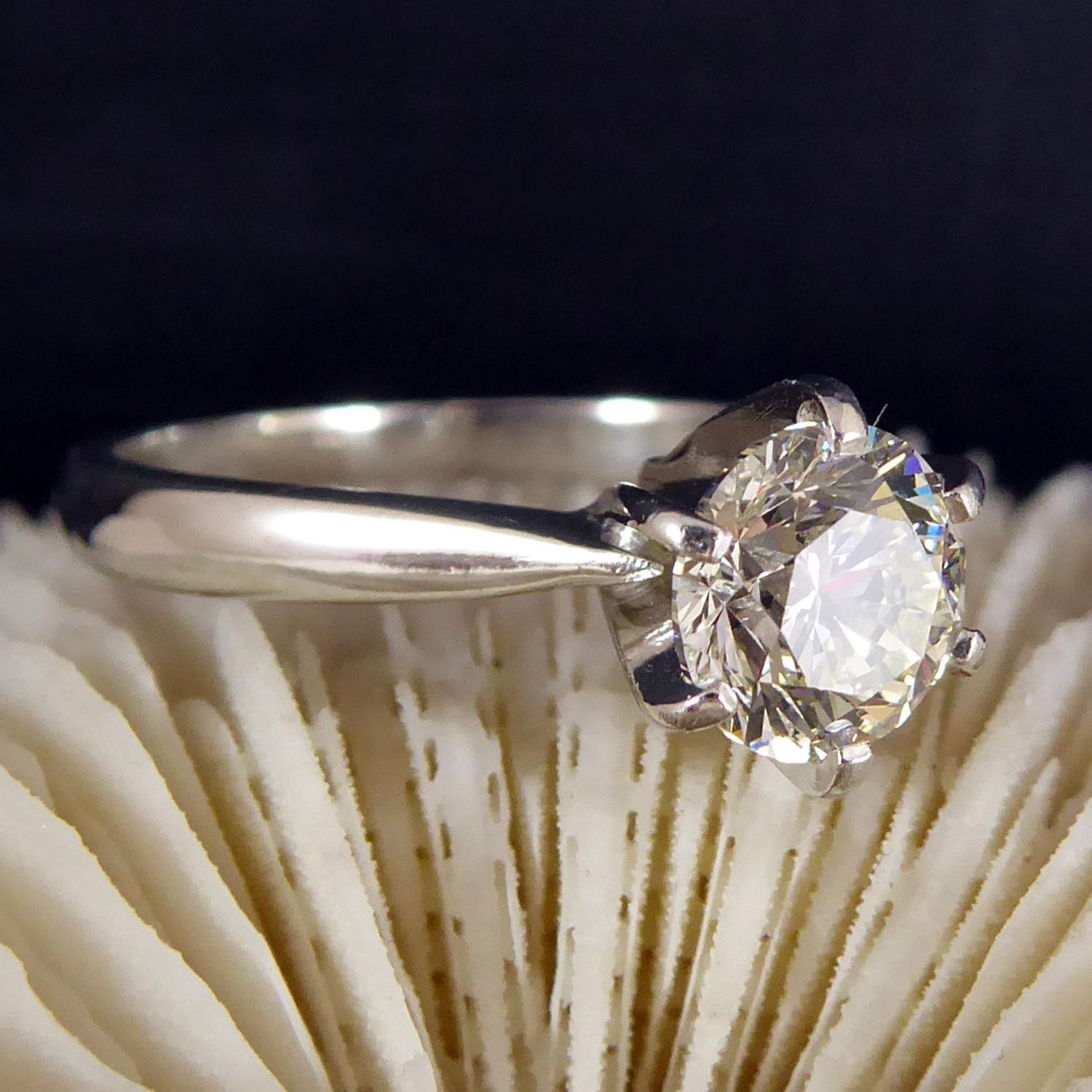 A pre-owned 1.0 carat solitaire diamond engagement ring with a certified diamond of VS1 clarity and I colour.  Claw set in white to a classic profile 