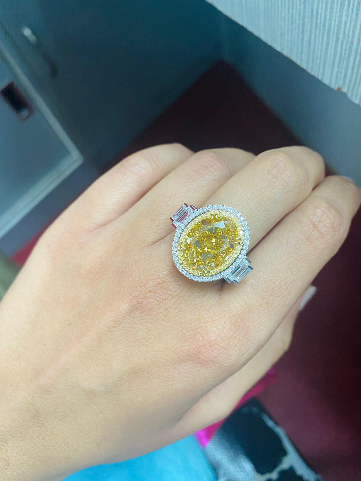 Oval Cut Certified 10.06 Carat Yellow Diamond Three-Stone Engagement Ring