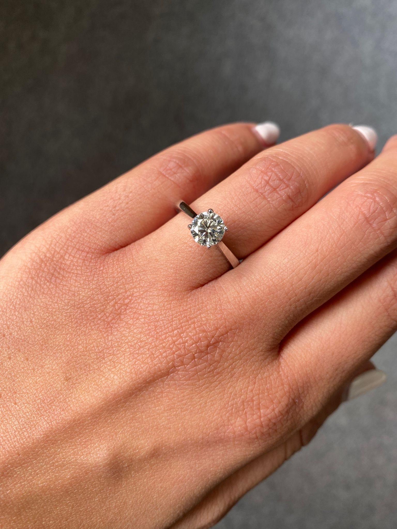 A classic, 1.01 carat VS2 quality, I color, Diamond solitaire ring - set in solid 18K White Gold. Comes with an IGI certificate. Currently sized at US6, can be resized.
We provide free shipping, and accept returns. 