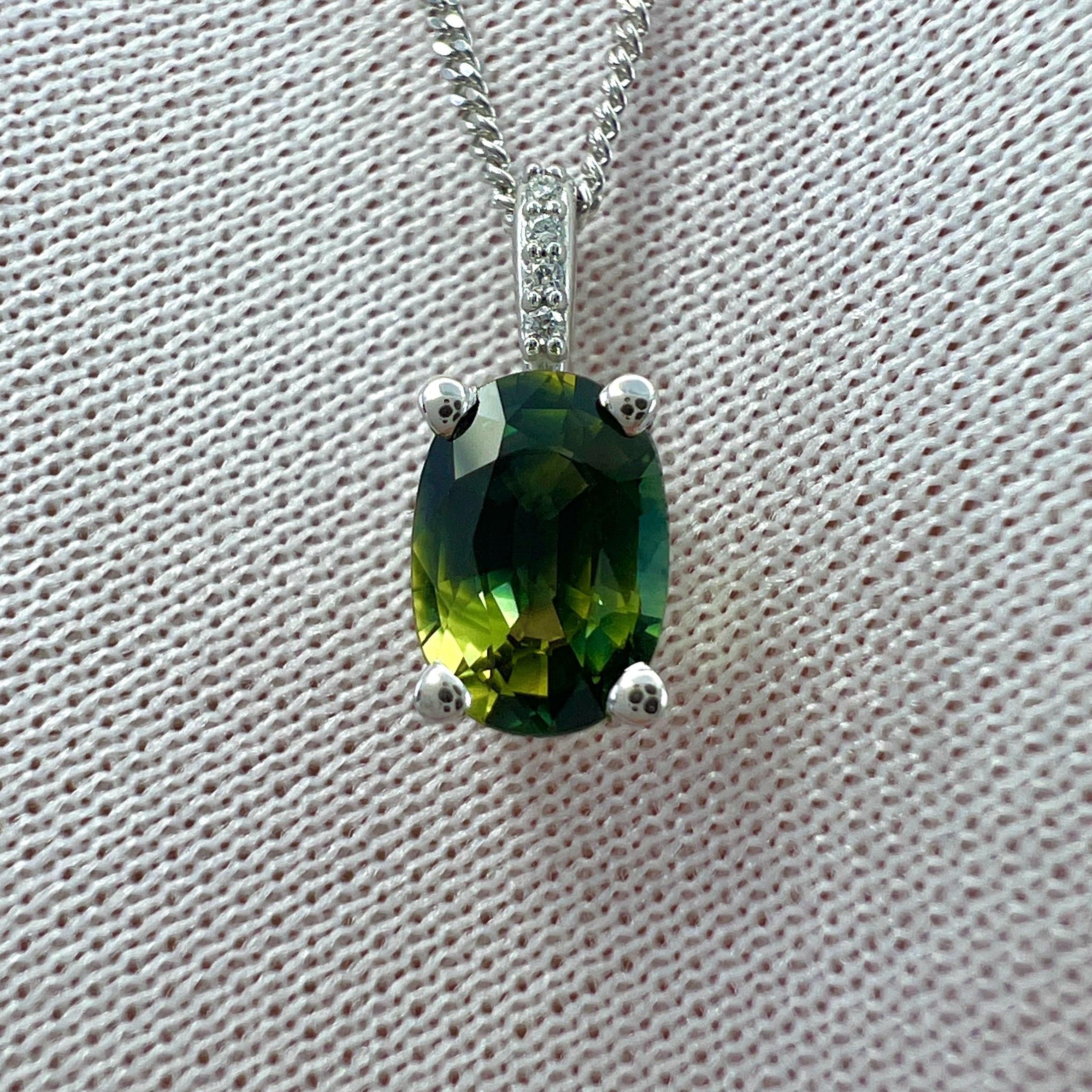 IGI Certified Green Yellow Blue Parti Colour Sapphire & Diamond 18k White Gold Hidden Halo Pendant Necklace.

1.01 Carat sapphire with a unique green yellow blue parti colour effect. Rare and stunning to see. This sapphire also has excellent