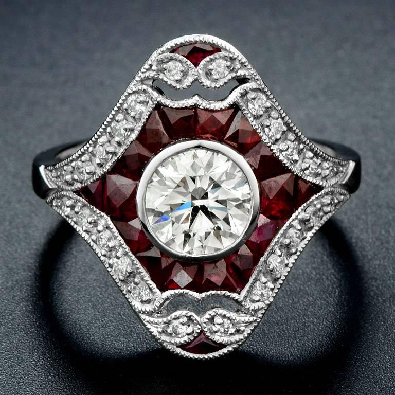 HRD Certified 1.02 Carat Brilliant Cut Diamond J Color VVS2 Clarity in the center with Ruby 18 pieces Total 1.82 Carat Surrounded with 24 pieces 0.21 Carat Diamond. The Ring was made in Platinum 950 size US#7

*The photo shows the real look of the