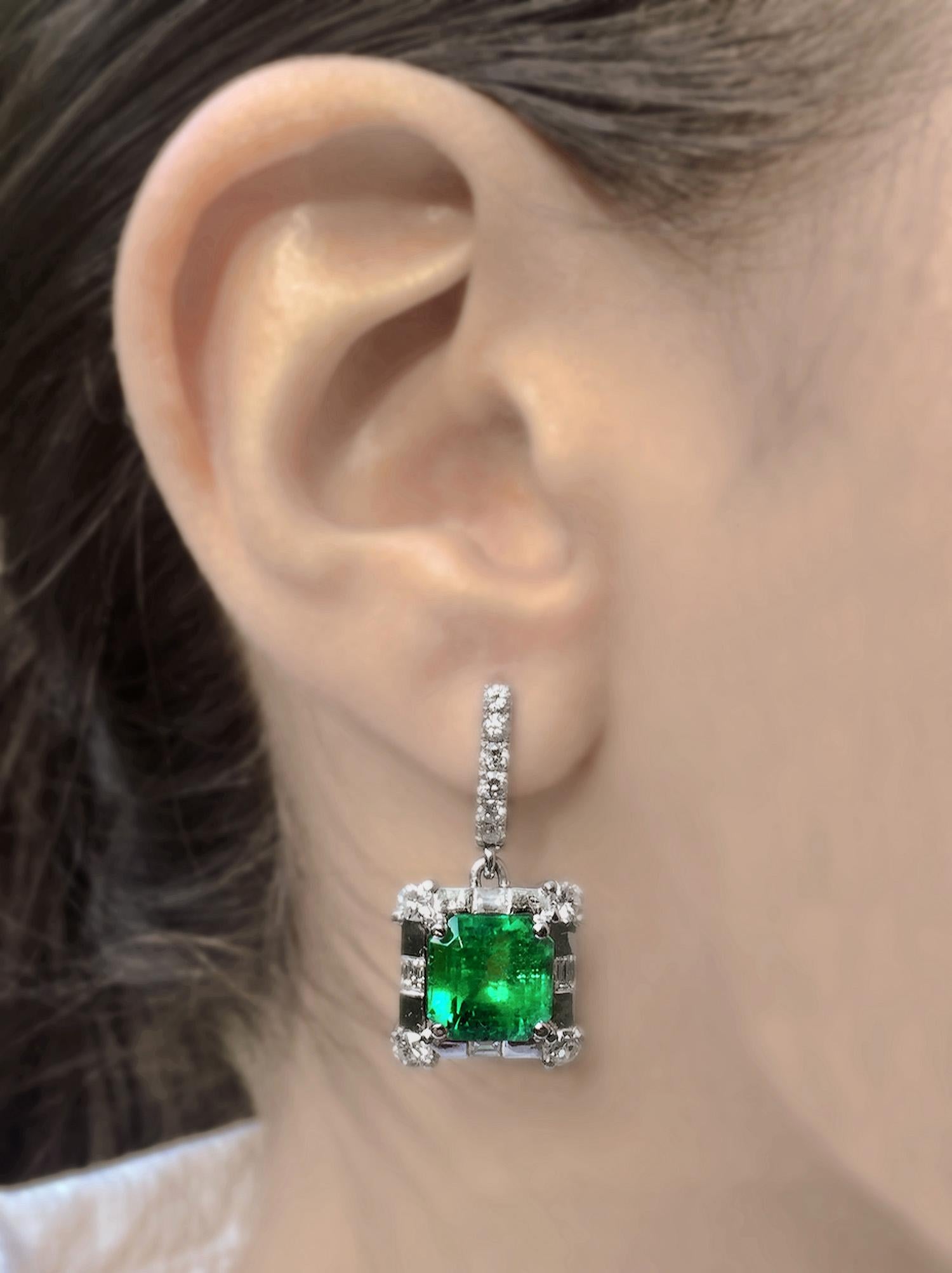 Luxurious  Colombian Emerald Earrings, features two fine square Colombian Emeralds, a total weight of 8.77 Carat, CDTEC Certified. The fine Colombian Emeralds show incredible color, brilliance, and clarity and are surrounded by approx. 2.00 Carats