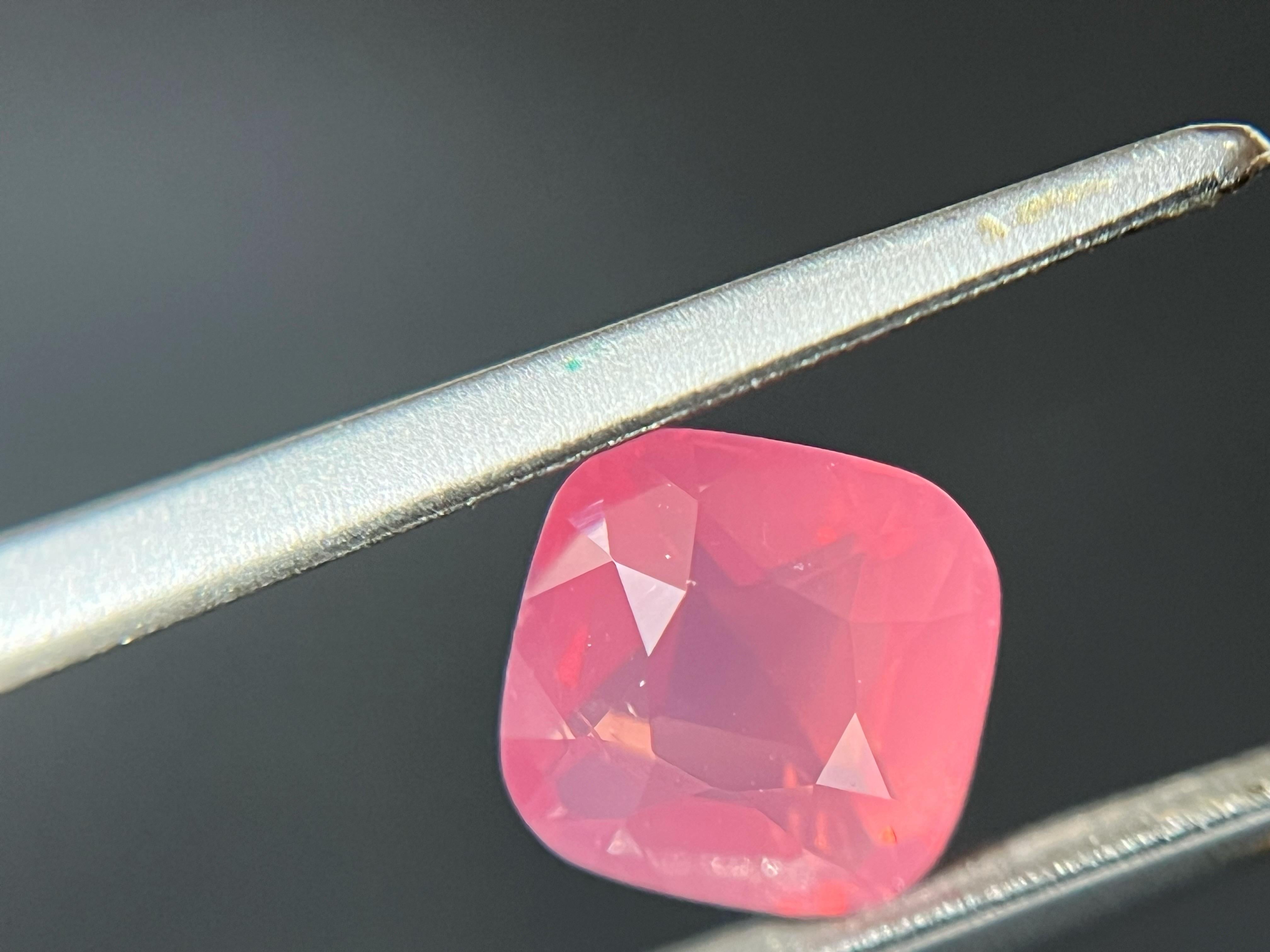 Introducing our exceptional Mahenge spinel with a silky body neon peach color and orange fire that is truly one-of-a-kind. This gemstone is a marvel of nature, with its rare and captivating hue that exudes warmth and vitality.

Sourced from the