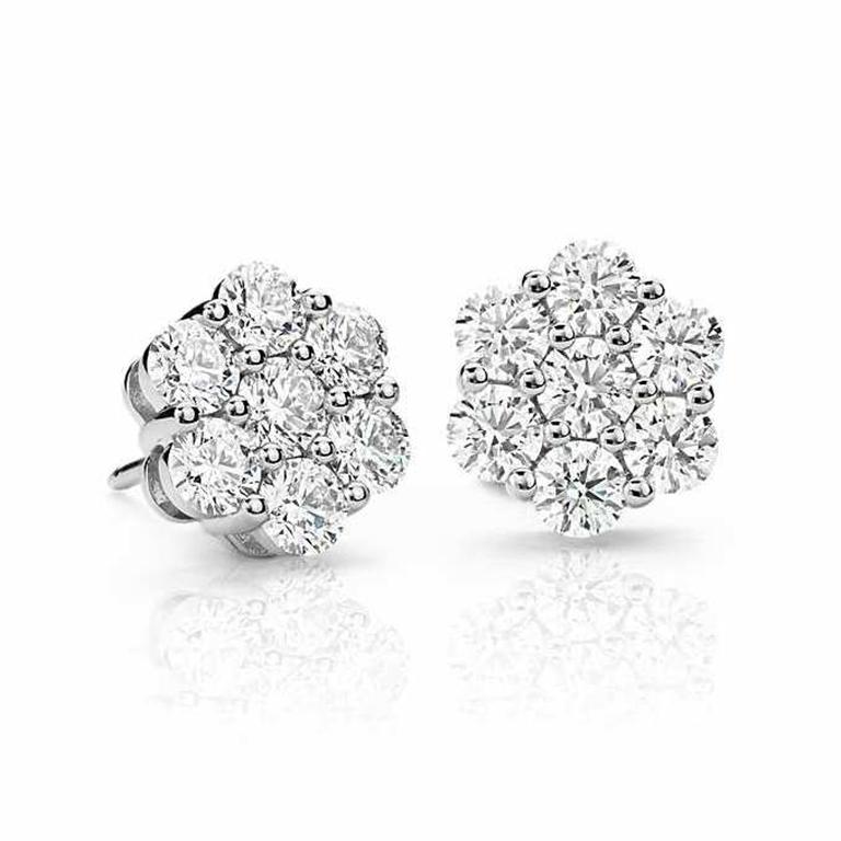 Intricate 1.00 Carat Round Diamond Flower Cluster Stud Earrings 8mm in 14K White Gold. Certified by IGI Laboratory in New York, with full diamond jewelry grading report.

1.00 Carats of Brilliant Round White VS-SI Diamonds,
and 2.50 grams of 14K