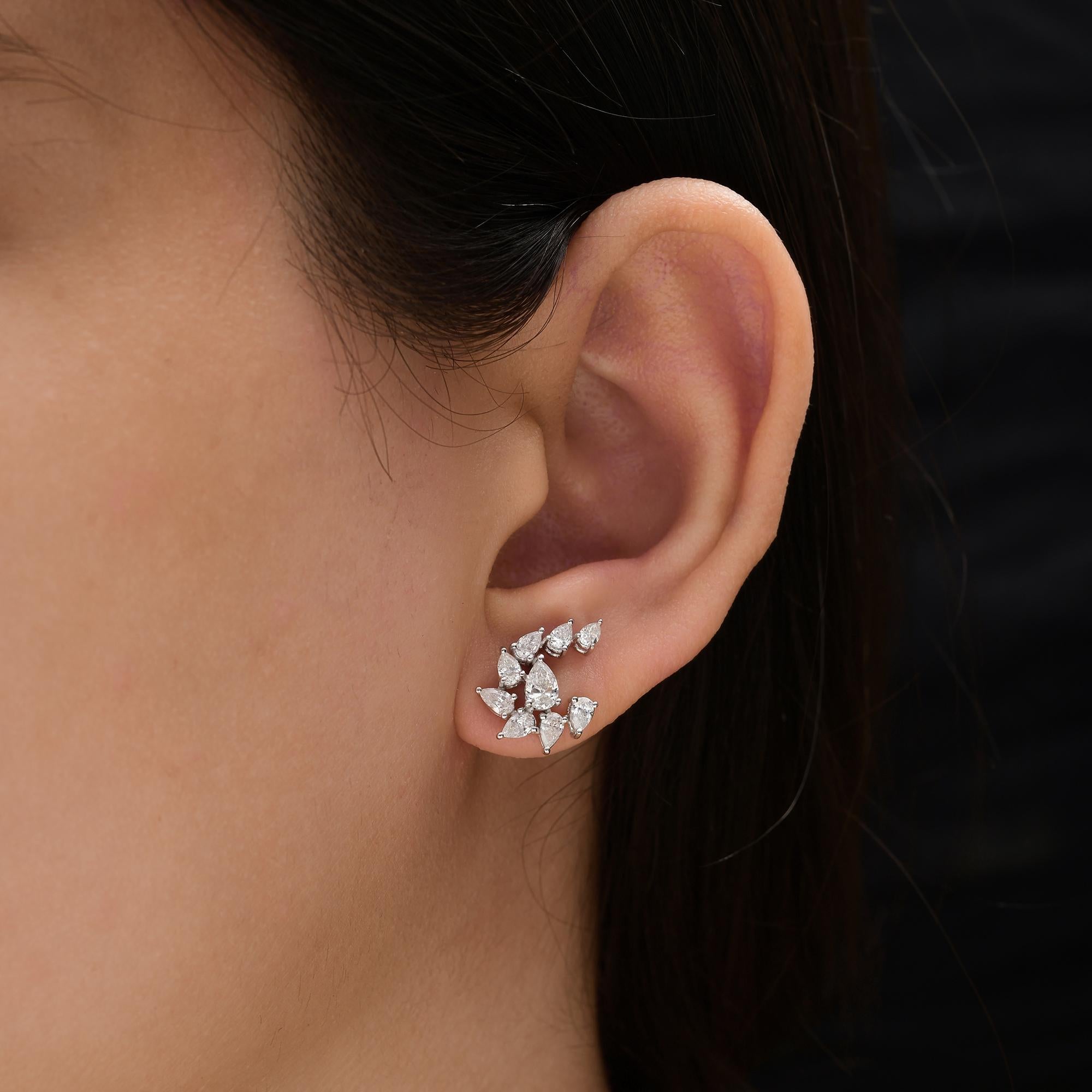 Certified 1.28 Ct SI/HI Diamond Floral Burst Stud Earrings 18 Karat White Gold 
Featuring a dynamic floral burst motif, each stud earring is beautifully arranged with pear-cut diamonds set in a circular bloom pattern. The design radiates outwards