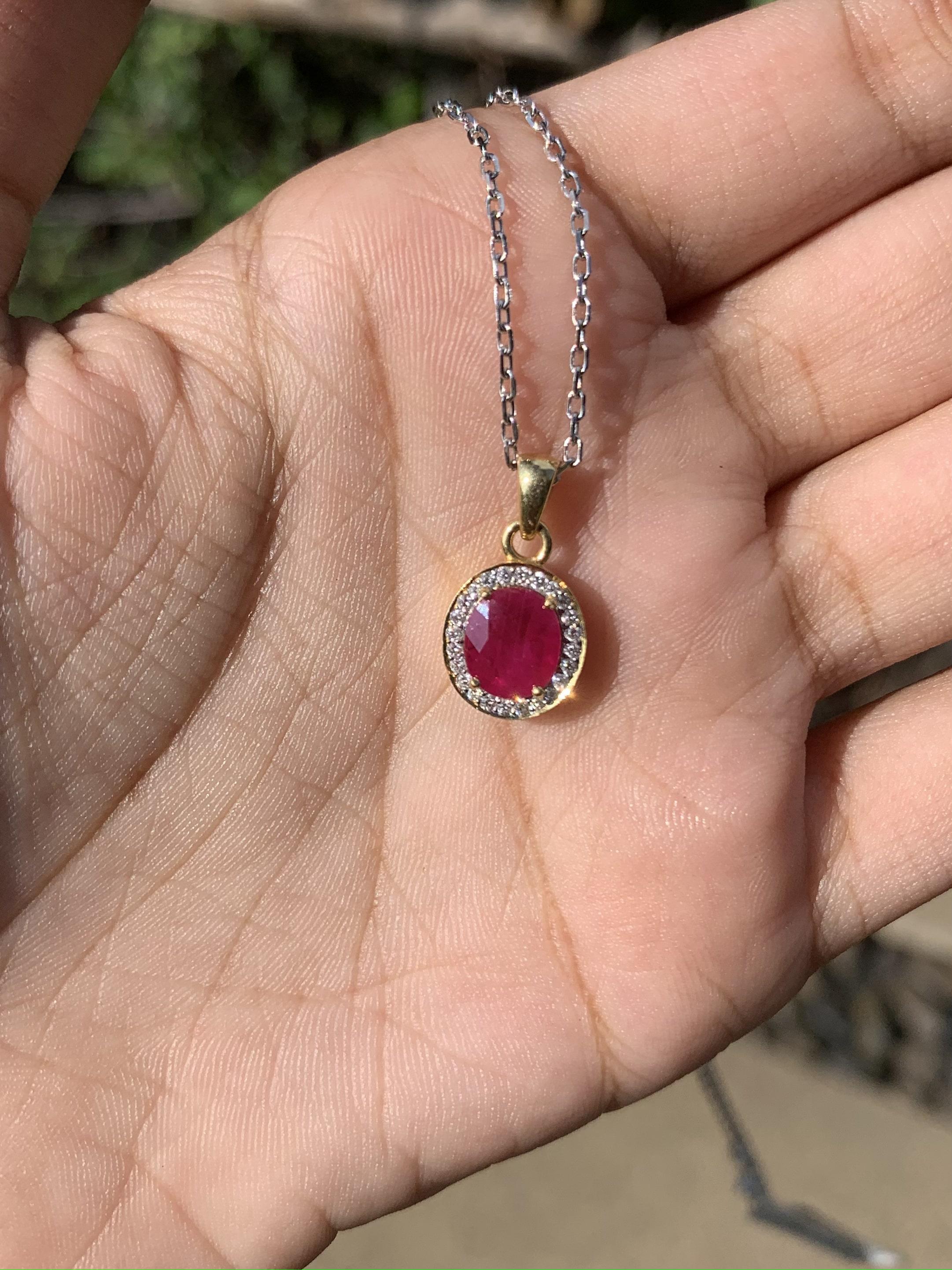 Presenting a dainty and stunning Ruby Pendant, that boasts an enchanting pigeon blood hue that will instantly steal your heart. 

Prepare to be enthralled by the sheer magnificence of this 1.29 Carat Ruby, that has an oval shape and is sourced from
