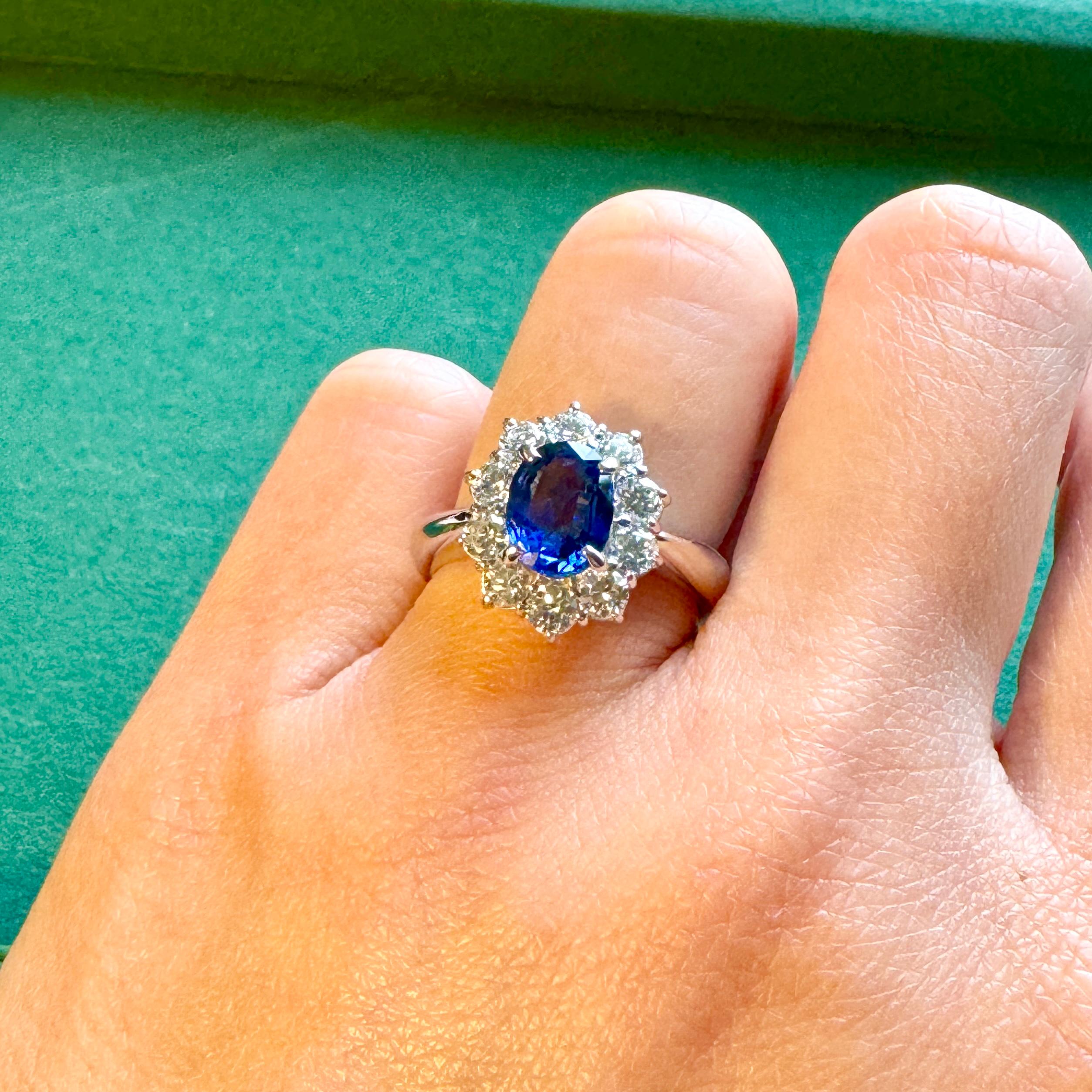 Art Deco Certified 1.3 carat Blue Sapphire & Diamond Vintage Princess Halo Platinum Ring For Sale