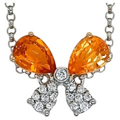 Bracciale in oro giallo e bianco con diamanti rotondi e granato Fanta certificato da 1,32 carati