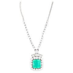 Vintage certified 13.50 Carat Colombian emerald and diamond necklace 