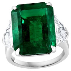 Certified 14.01 Carat Emerald cut Emerald and Diamond 3 Stone Engagement Ring