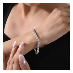 Bracciale tennis con diamanti taglio brillante certificato da 14,87 carati in oro bianco 18 carati
