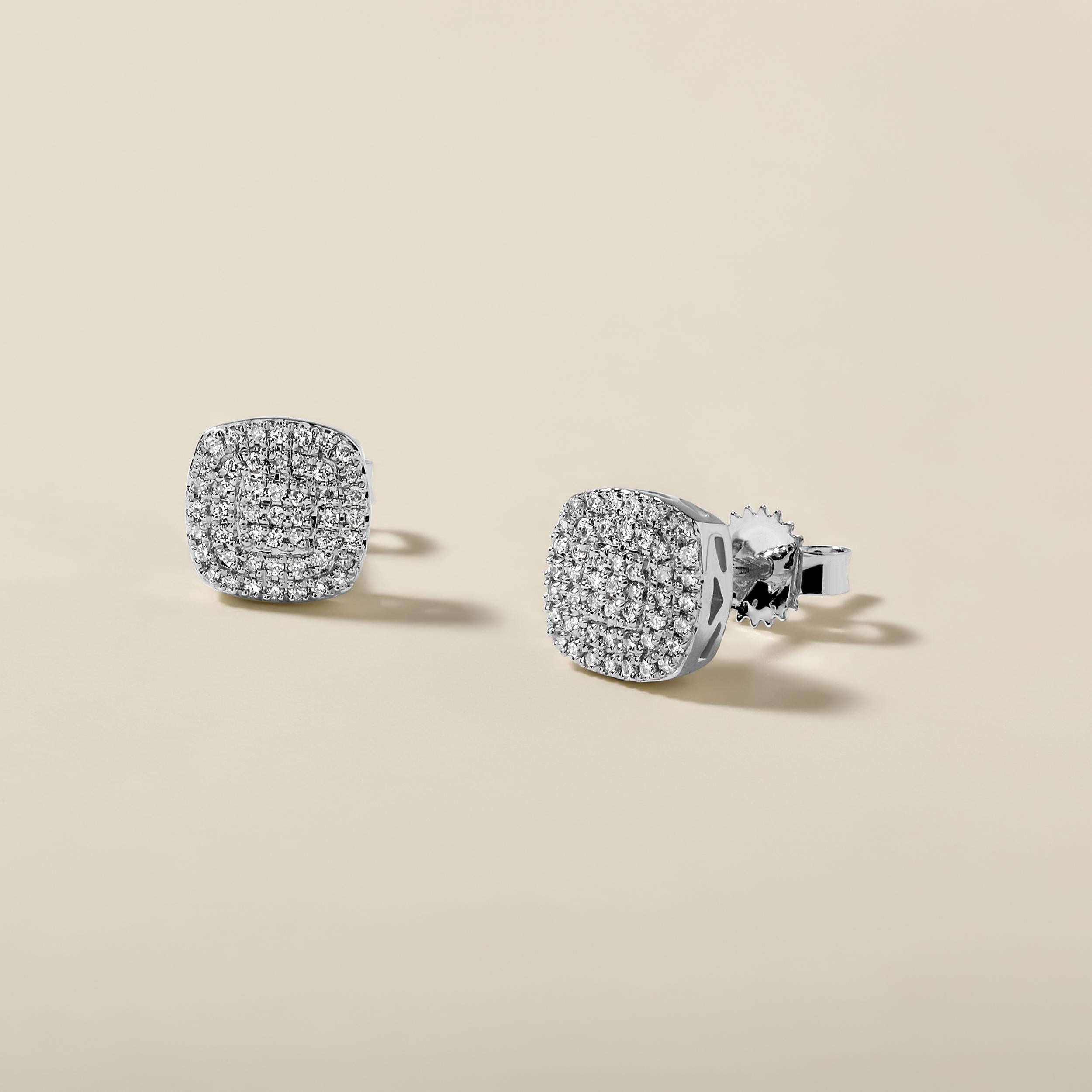 Crafted in 1.68 grams of 14K White Gold, the earrings contain 98 stones of Round Natural Diamonds with a total of 0.14 carat in F-G color and I1-I2 clarity.

CONTEMPORARY AND TIMELESS ESSENCE: Crafted in 14-karat/18-karat with 100% natural diamond
