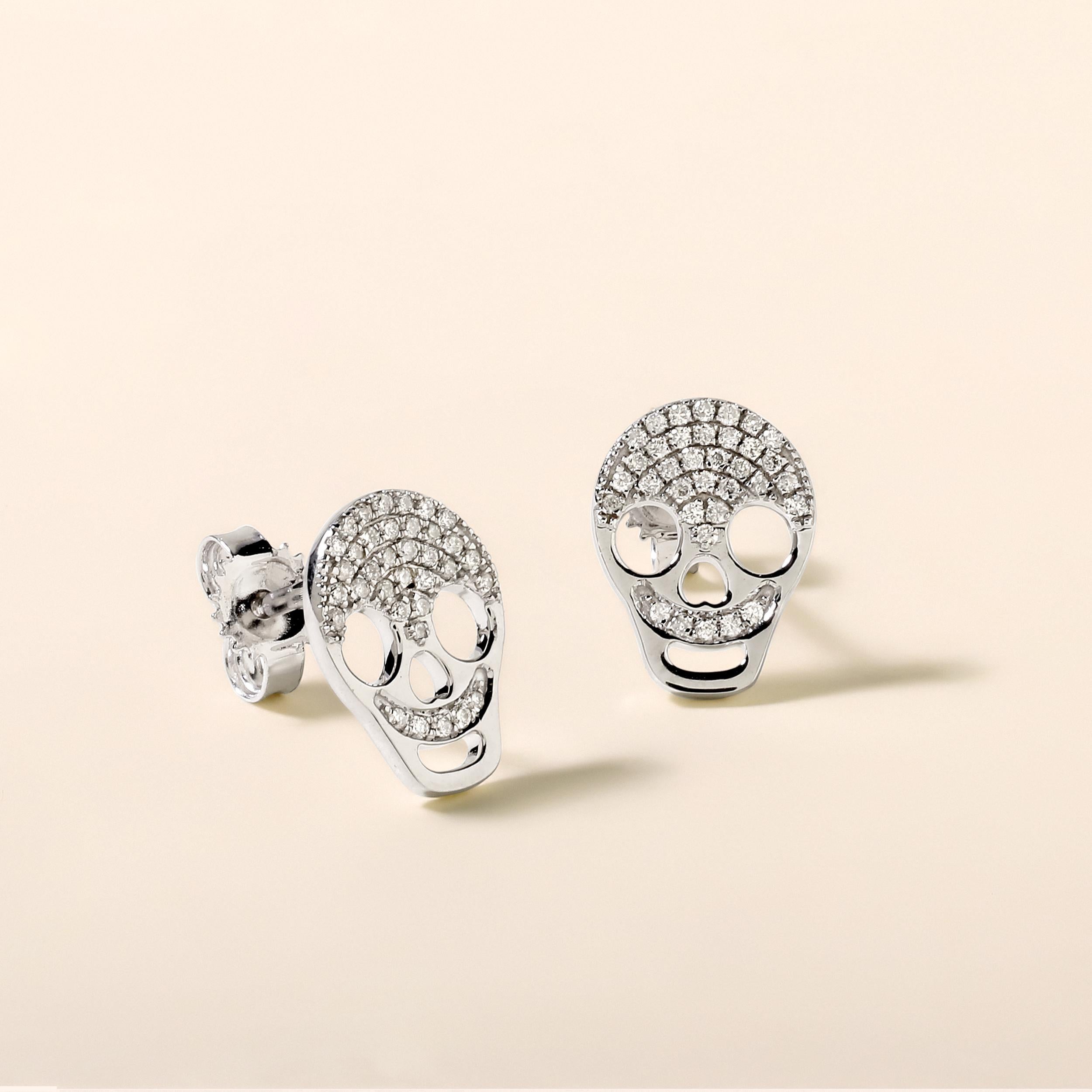Crafted in 1.49 grams of 14K White Gold, the earrings contains 70 stones of Round Diamonds with a total of 0.14 carat in F-G color and I1-I2 clarity.

CONTEMPORARY AND TIMELESS ESSENCE: Crafted in 14-karat/18-karat with 100% natural diamond and