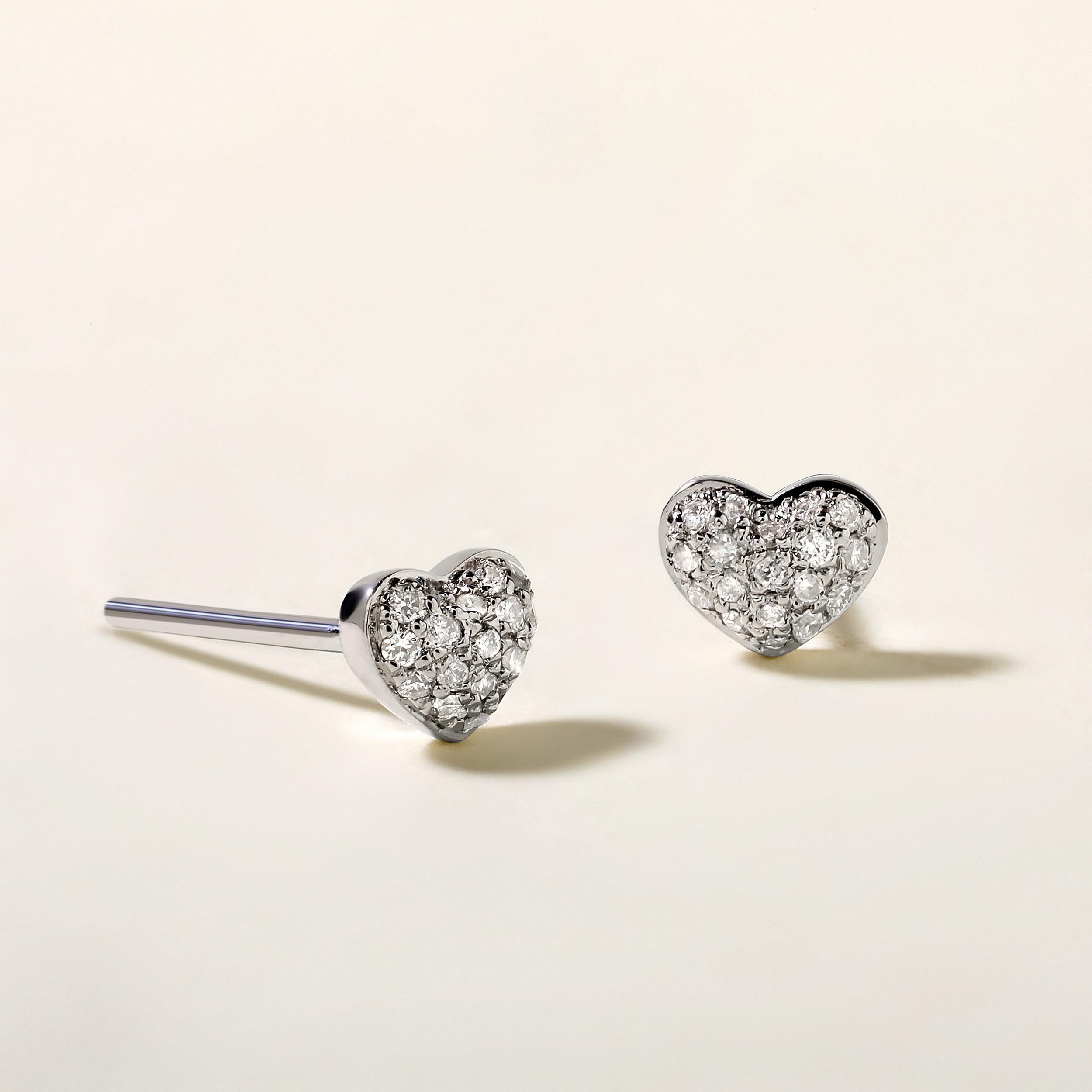 Crafted in 1.02 grams of 14K White Gold, the earrings contains 36 stones of Round Diamonds with a total of 0.14 carat in F-G color and I1-I2 clarity.

CONTEMPORARY AND TIMELESS ESSENCE: Crafted in 14-karat/18-karat with 100% natural diamond and