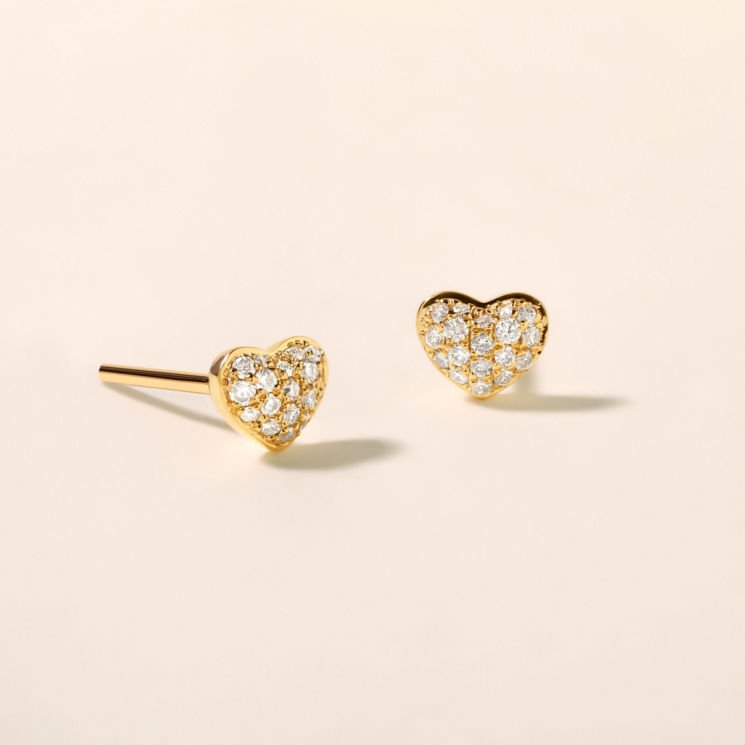 Crafted in 1 gram of 14K Yellow Gold, the earrings contains 36 stones of Round Diamonds with a total of 0.14 carat in F-G color and I1-I2 clarity.
This jewelry piece will be expertly crafted by our skilled artisans upon order. Allow us a shipping