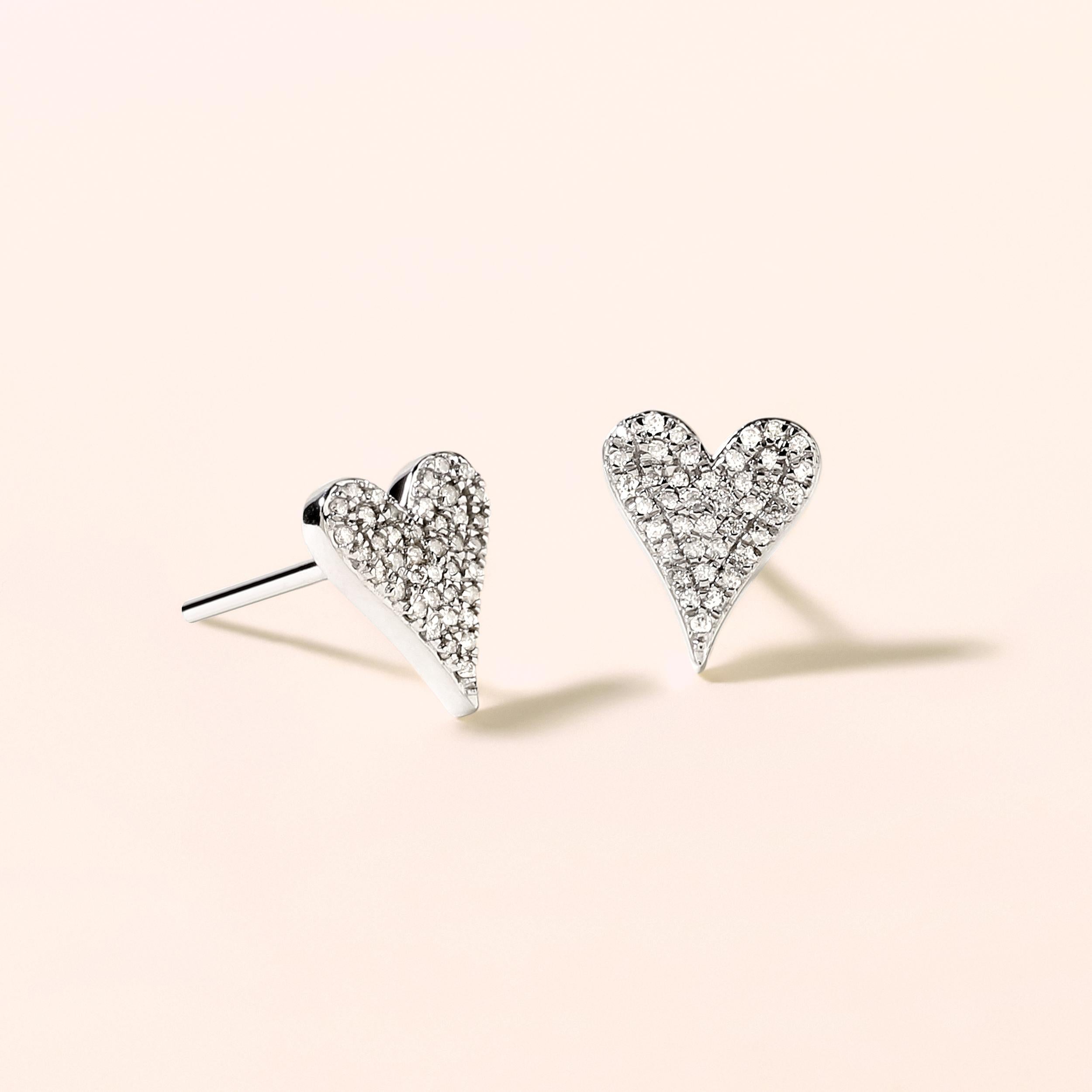 Crafted in 1.58 grams of 14K White Gold, the earrings contains 80 stones of Round Diamonds with a total of 0.15 carat in G-H color and SI clarity.

This jewelry piece will be expertly crafted by our skilled artisans upon order. Allow us a shipping