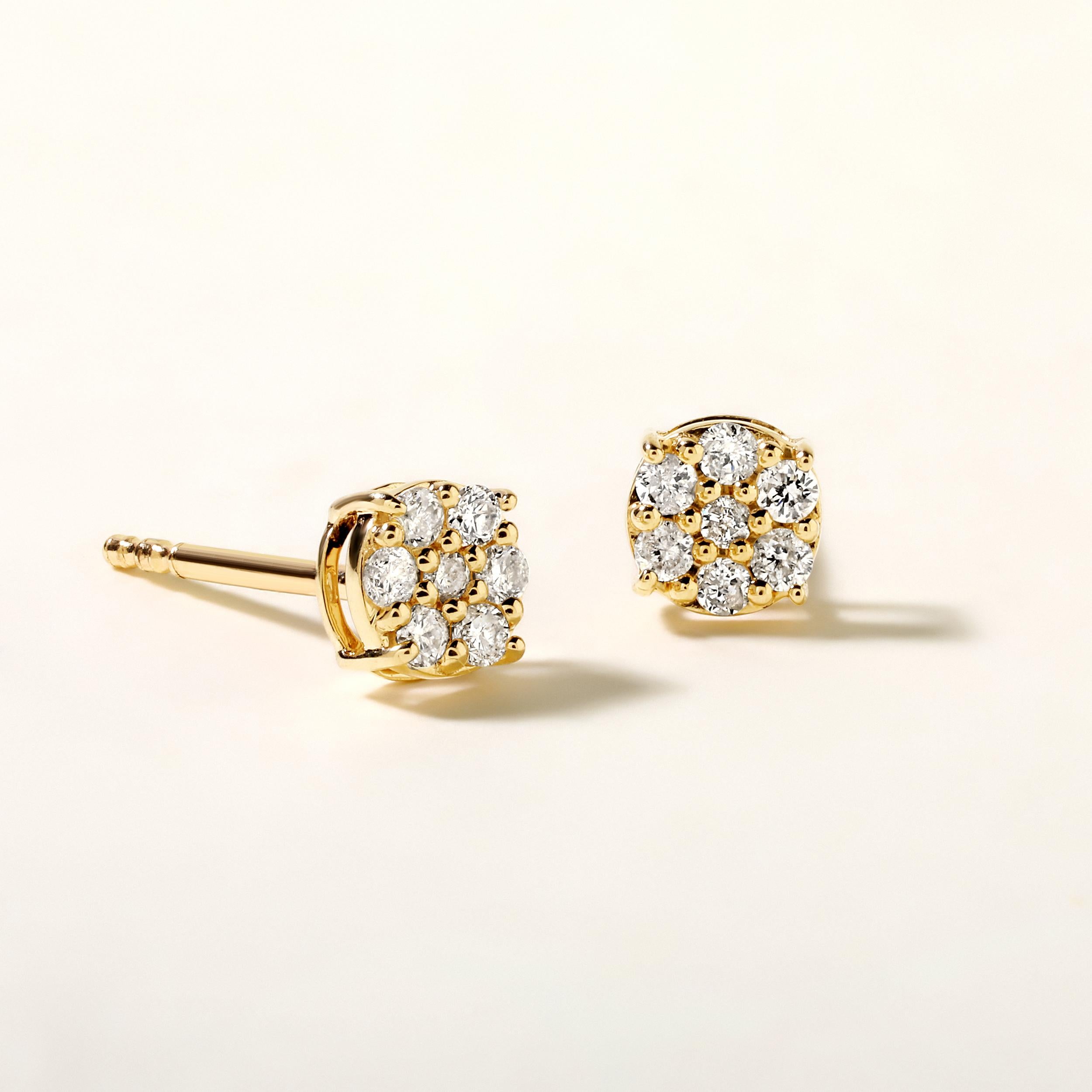 Crafted in 0.87 grams of 14K Yellow Gold, the earrings contains 14 stones of Round Diamonds with a total of 0.18 carat in F-G color and I1-I2 clarity.

CONTEMPORARY AND TIMELESS ESSENCE: Crafted in 14-karat/18-karat with 100% natural diamond and