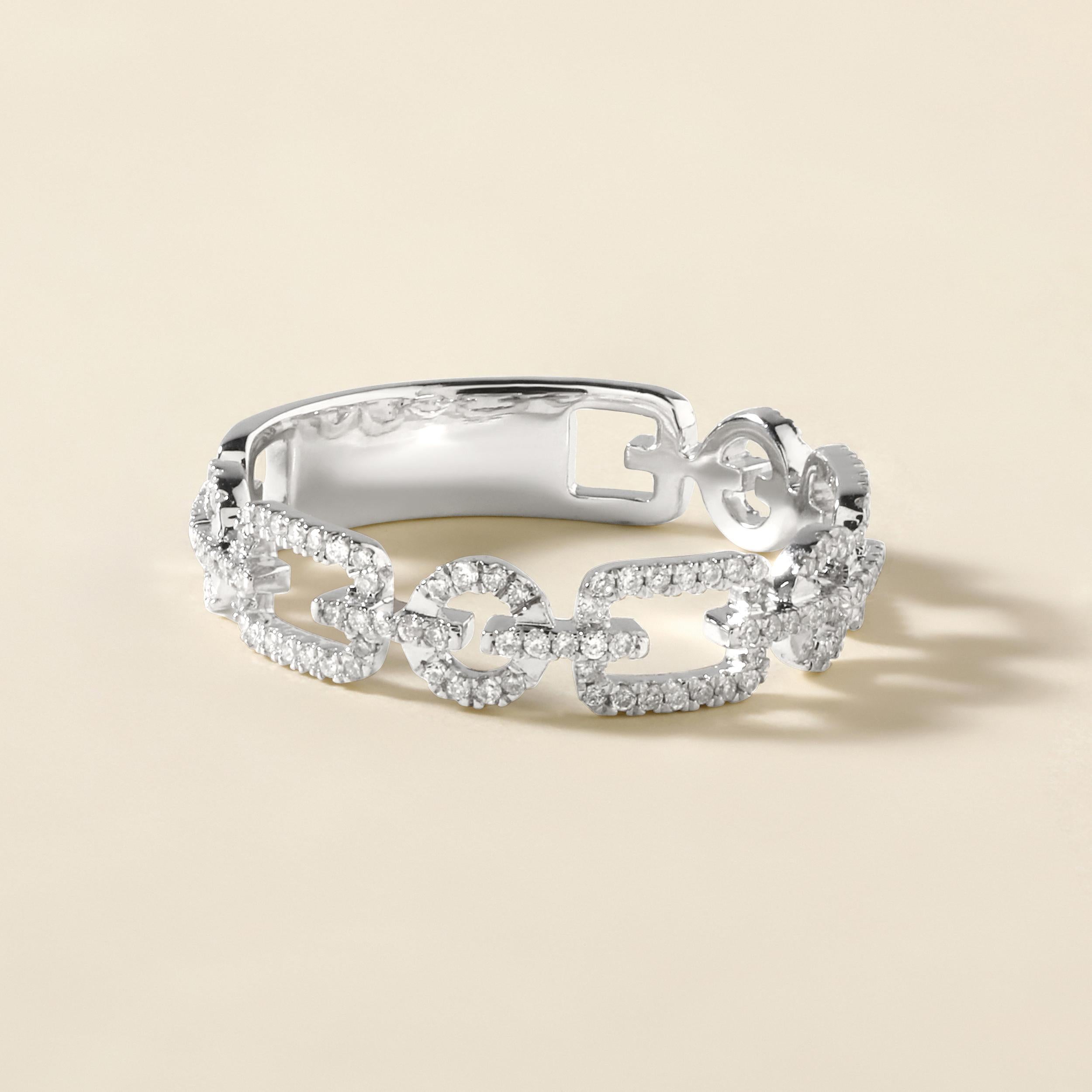 Ring Size: US 7

Crafted in 2.06 grams of 14K White Gold, the ring contains 126 stones of Round Natural Diamonds with a total of 0.24 carat in G-H color and I1-I2 clarity.combined with 1 stone of Round Solitaire Natural Diamond with a total of 0.16