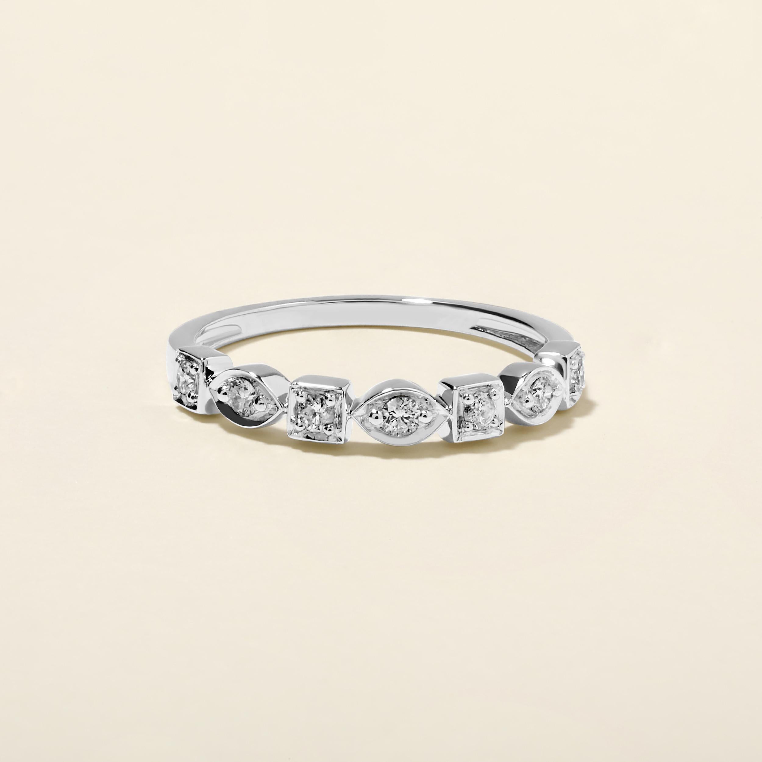 Ring Size: US 7

Crafted in 1.85 grams of 14K White Gold, the ring contains 7 stones of Round Natural Diamonds with a total of 0.18 carat in G-H color and I1-I2 clarity.

CONTEMPORARY AND TIMELESS ESSENCE: Crafted in 14-karat/18-karat with 100%