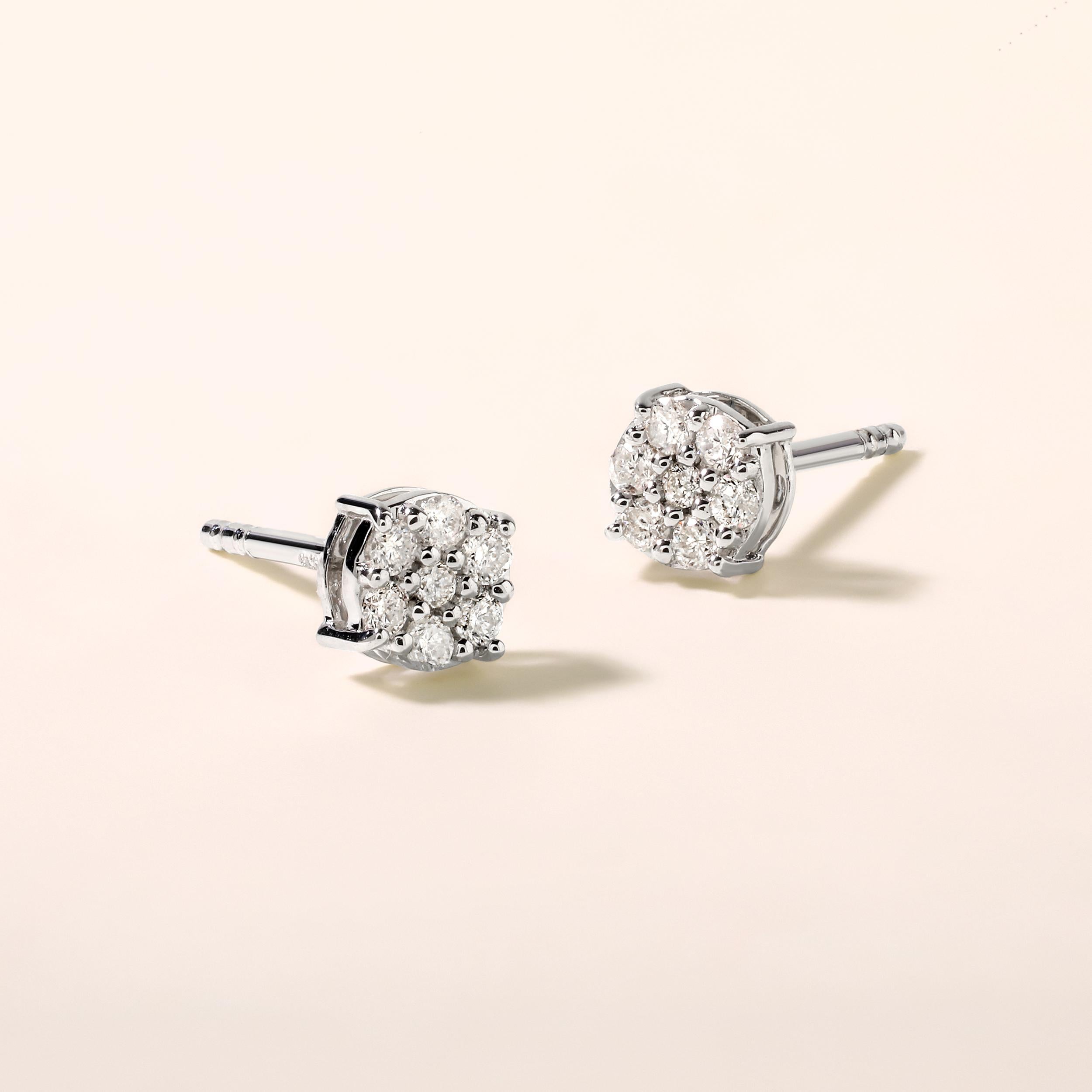 Crafted in 0.88 grams of 14K White Gold, the earrings contains 14 stones of Round Diamonds with a total of 0.19 carat in F-G color and I1-I2 clarity.

This jewelry piece will be expertly crafted by our skilled artisans upon order. Allow us a