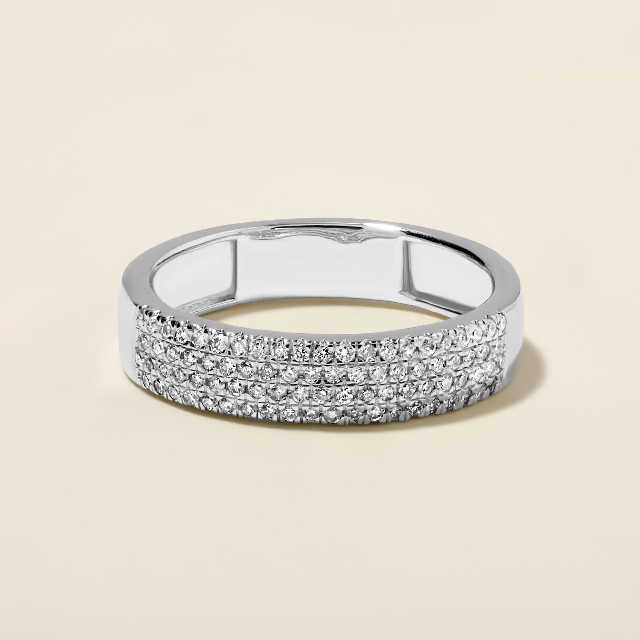 Ring Size: US 7

Crafted in 3.17 grams of 14K White Gold, the ring contains 82 stones of Round Natural Diamonds with a total of 0.29 carat in G-H color and I1-I2 clarity.

CONTEMPORARY AND TIMELESS ESSENCE: Crafted in 14-karat/18-karat with 100%